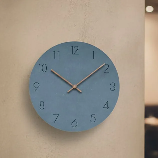 Blue wall clock in an interior