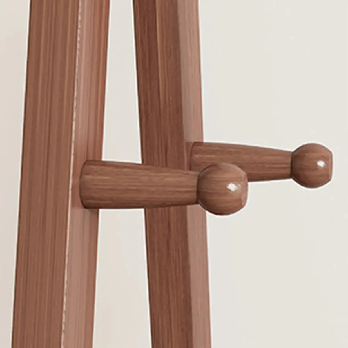 Detail of the nut brown wooden side hooks
