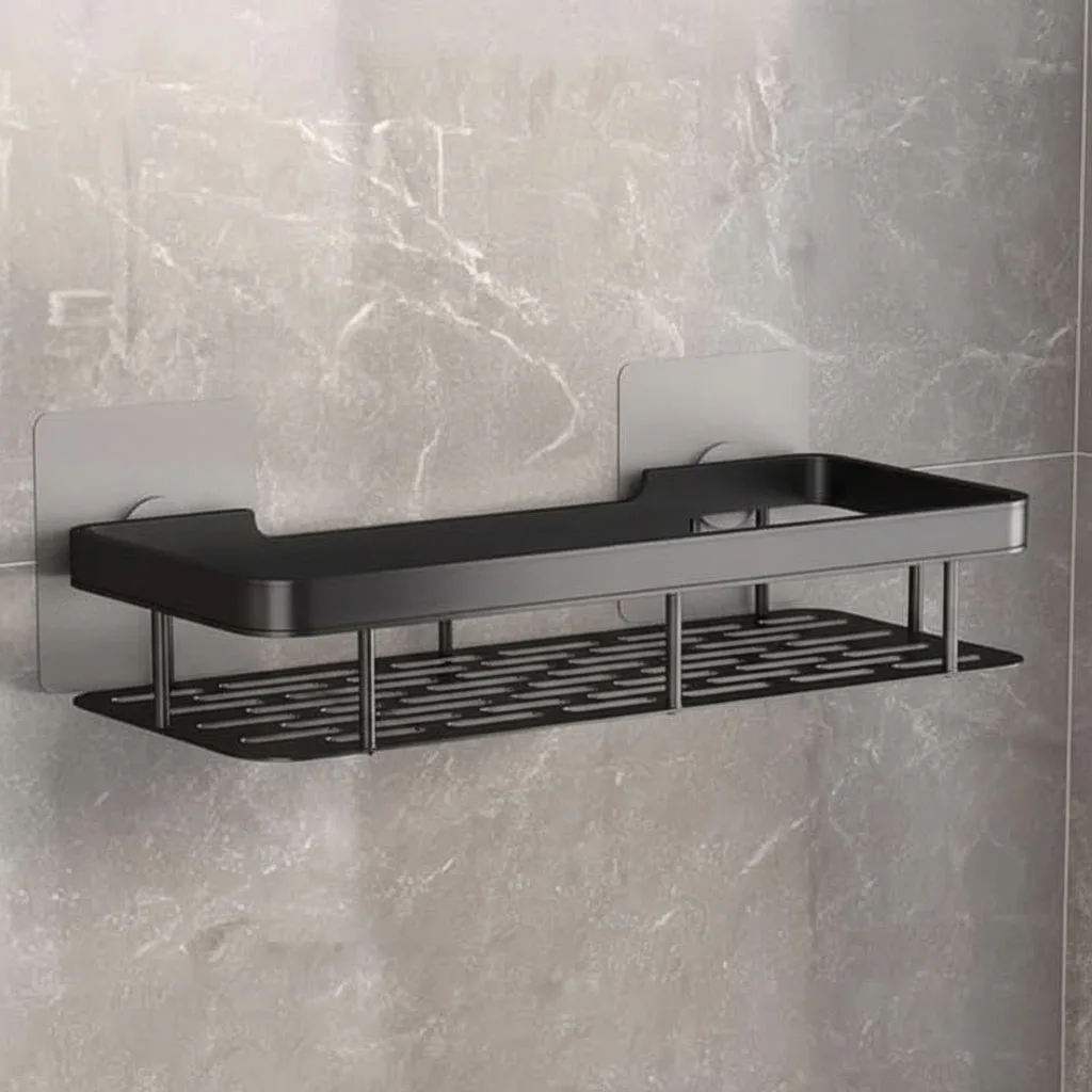 Black single shelf viewed without toiletries