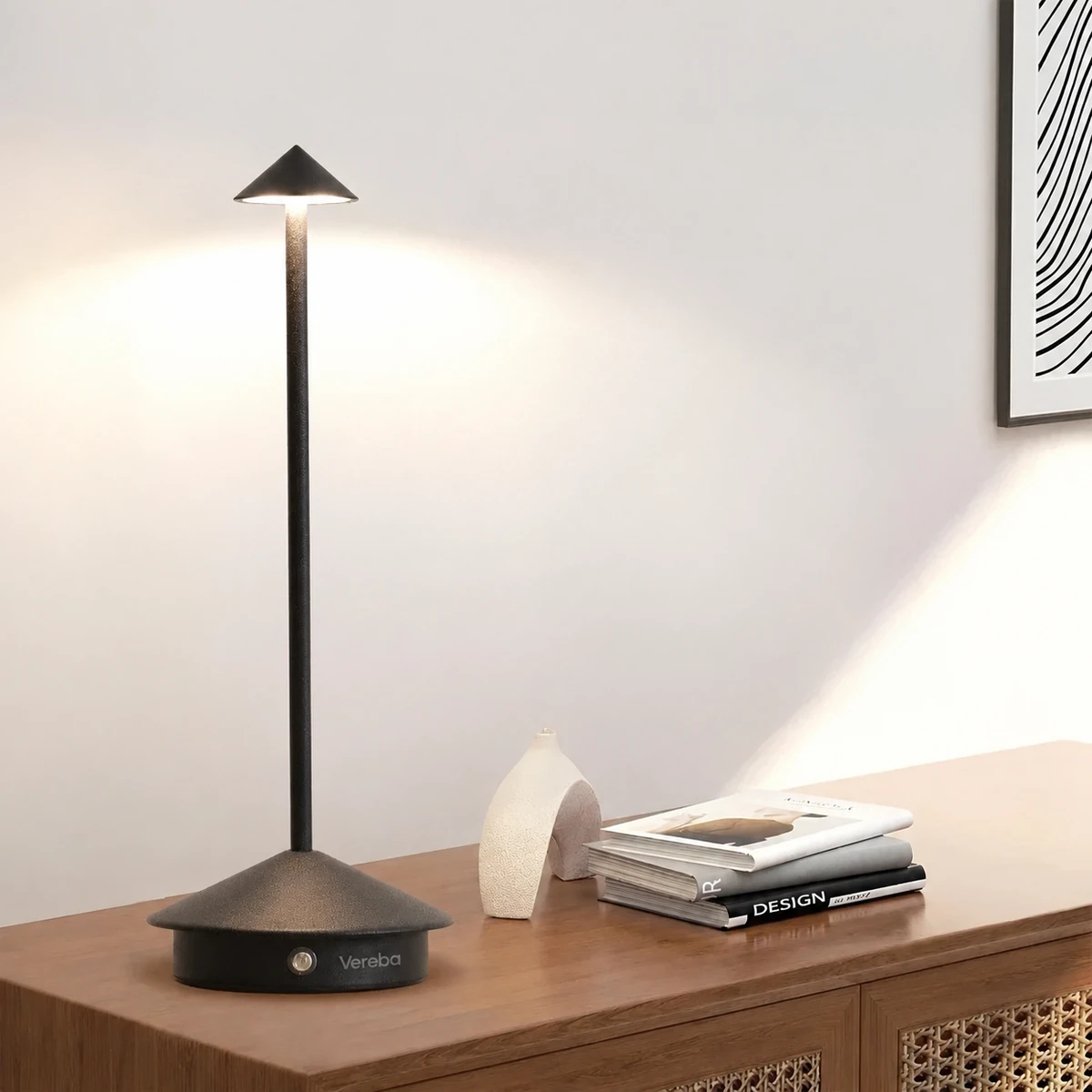 Vereba black cone rechargeable table lamp with a slim stem and round base.
