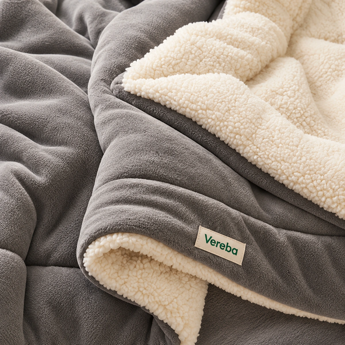 Gray fleece and cream sherpa blanket fabric detail